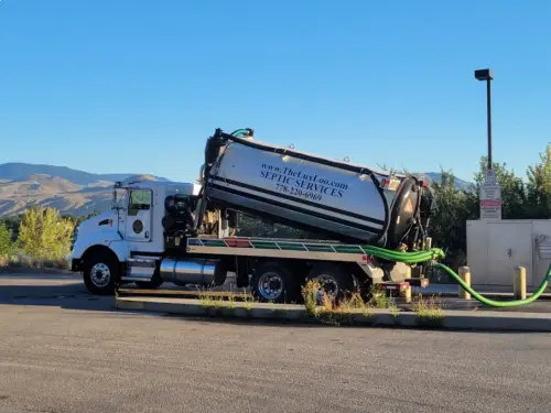 septic tank being pumped out on a rural Kamloops BC property during a pre-purchase inspection