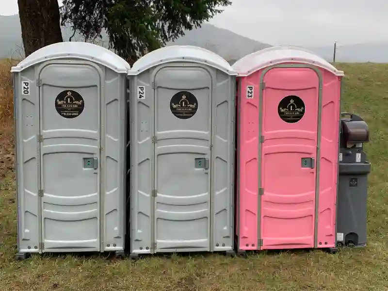 3 porta potties in a row