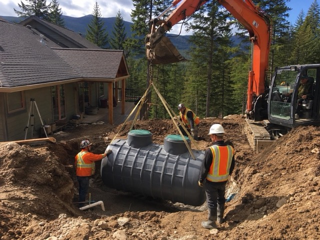 Plastic poly residential septic tank being installed at a Kamloops BC property